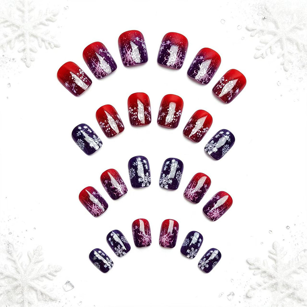 Artificial nails with festive glitter effect and wintry snow motif Kalsten