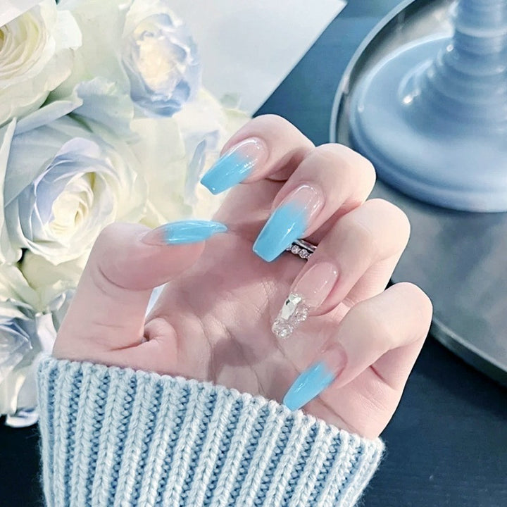 Nail set with elegant ombre and glitter accents Kalsten