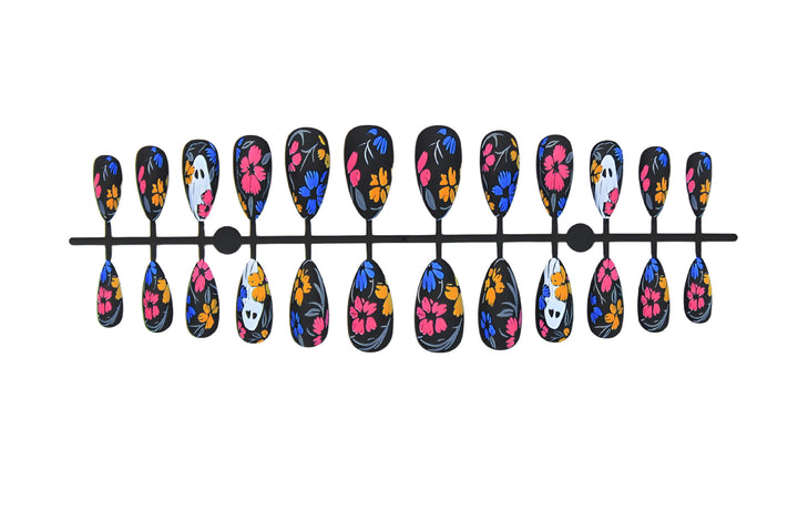Artificial nail set with spooky Halloween design and colorful floral accents Kalsten