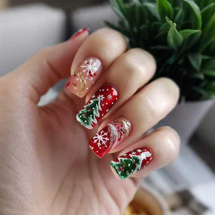 Artificial nail set with festive Christmas designs and glitter accents Kalsten