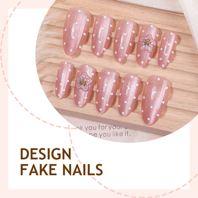 Artificial nail set with glitter and delicate floral and rhinestone embellishments Kalsten