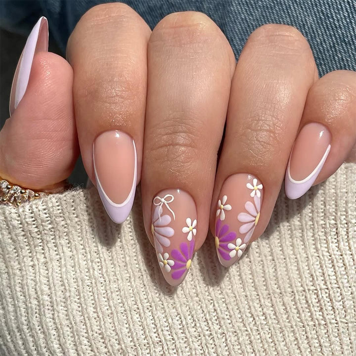 Artful nail extensions with floral accents and shine Kalsten