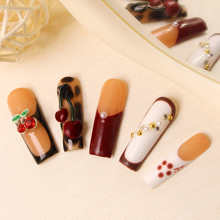 Nail art set with luxurious cherry and glitter accents Kalsten