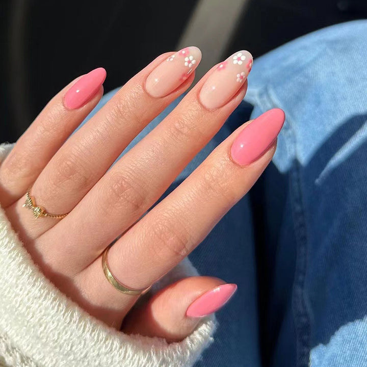 Artful nail extensions with delicate floral accents Kalsten