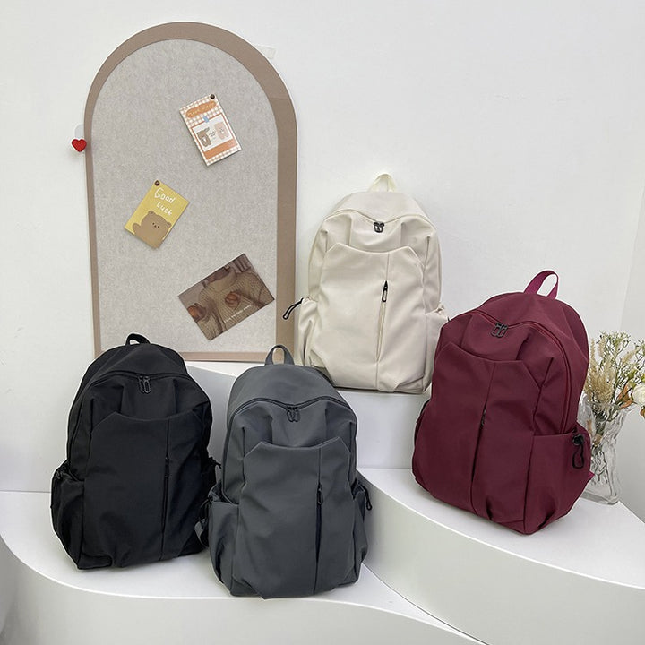 Backpack with Versatile Compartments and Charming Pendant Kalsten