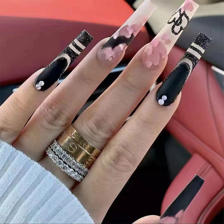 Artificial nail set with creative 3D elements and sparkling accents Kalsten
