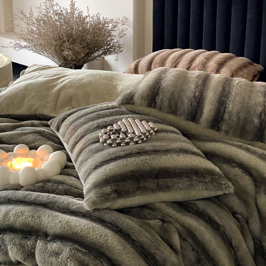 Luxury faux fur throw and cushion set with striped texture