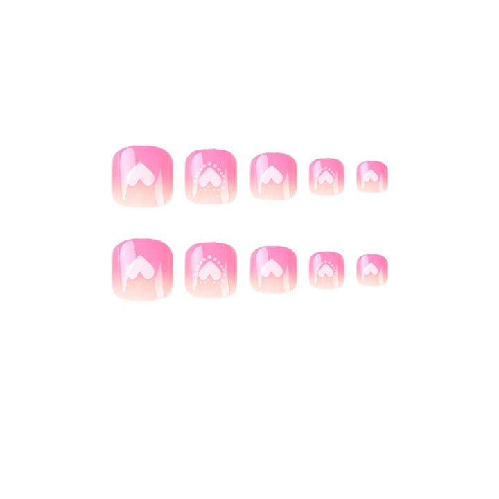 Artful toenail design with heart motifs Kalsten
