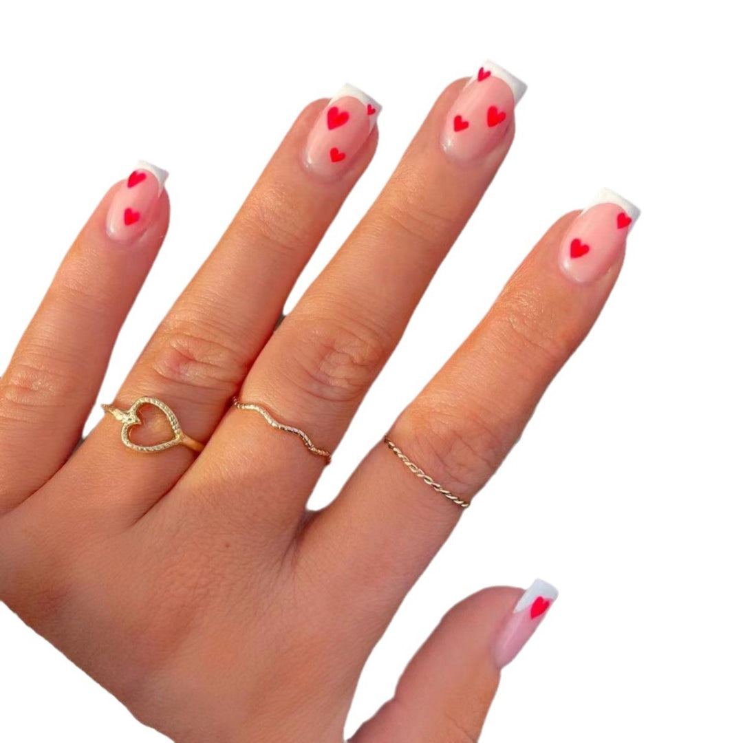 Heart-Embellished French Tip Nail Art Kalsten