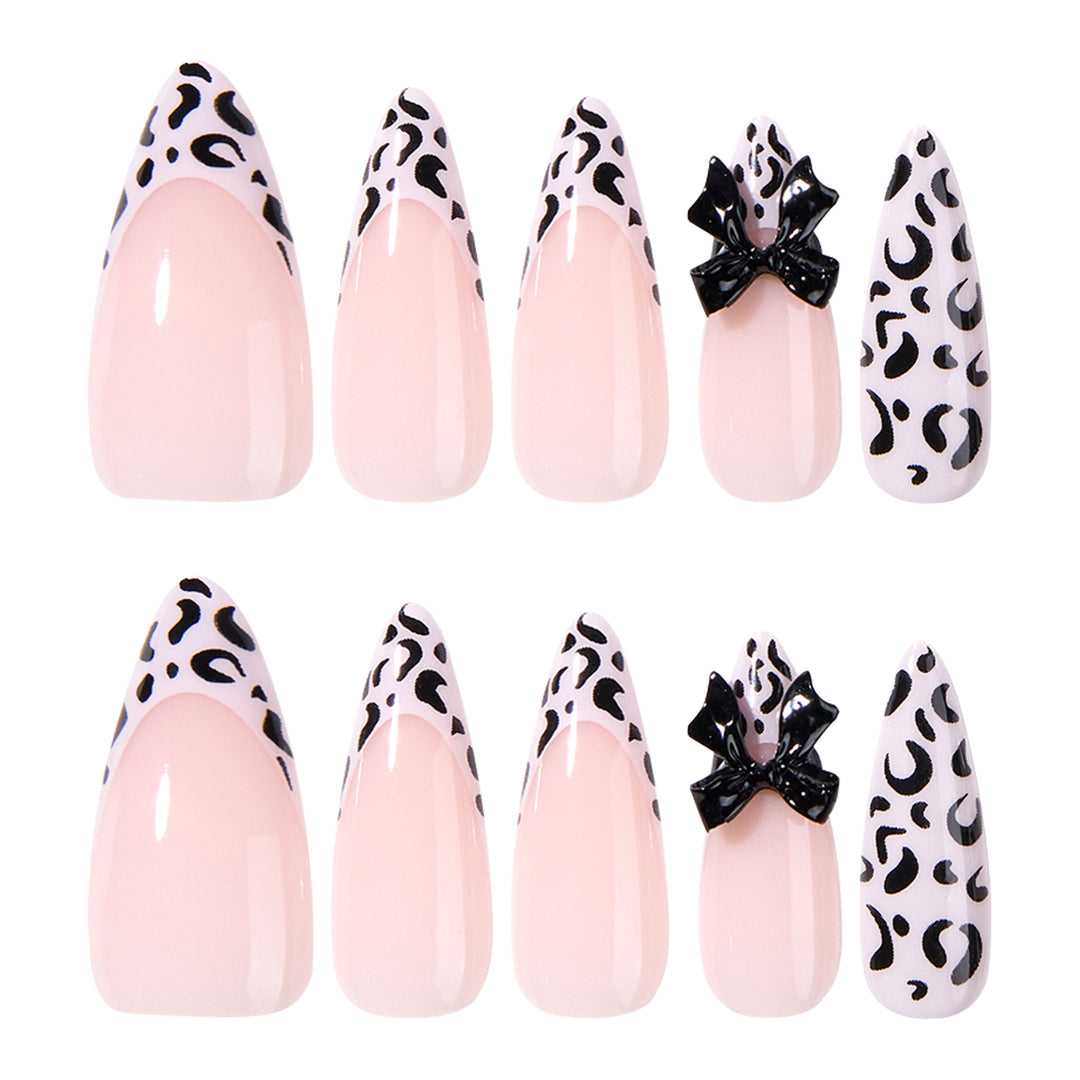Artful Stiletto Nails with Leopard Print and Bow Accent Kalsten