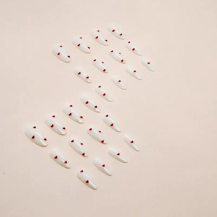 Nail set with playful heart design and elegant finish Kalsten