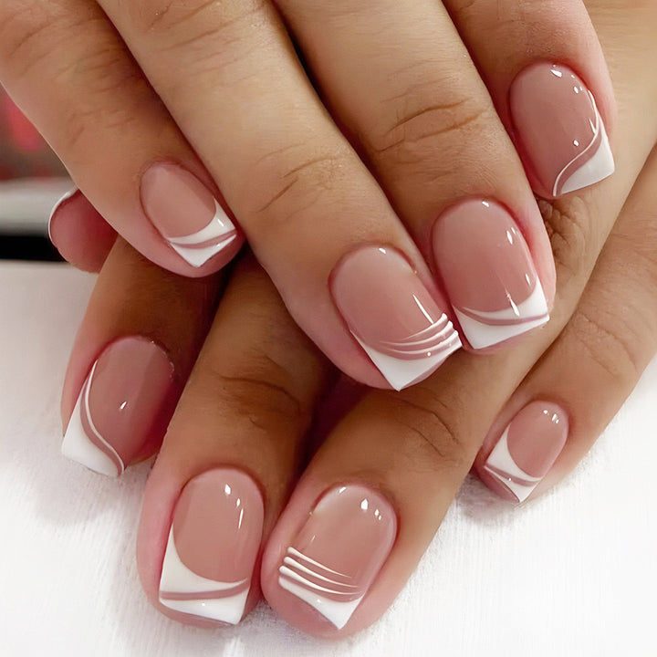 Artificial nail set with elegant French nail design and modern lines Kalsten
