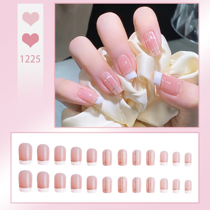 Nail set with elegant French tip and fashionable embellishments Kalsten