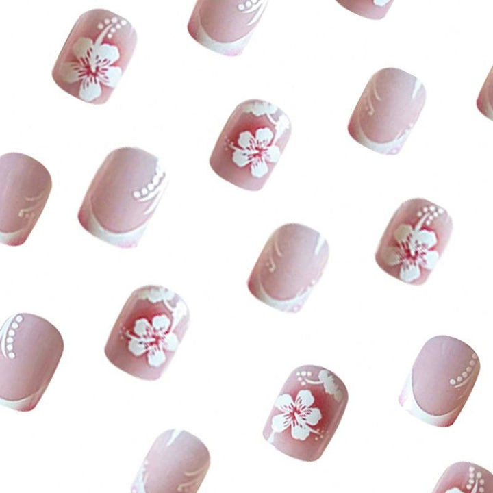 Acrylic nail set with elegant flower and French tip designs Kalsten