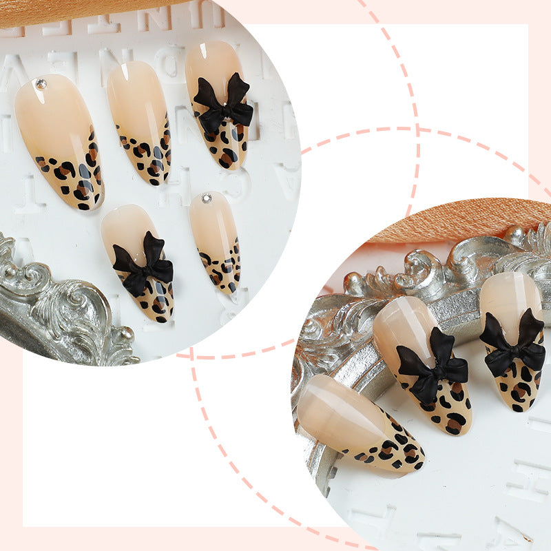Creative nail set with leopard design and glitter accents Kalsten