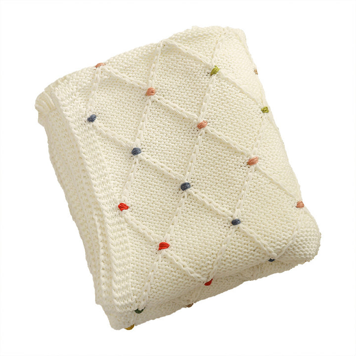 Knitted baby blanket made of cotton blend with diamond pattern and colorful stitch points Kalsten