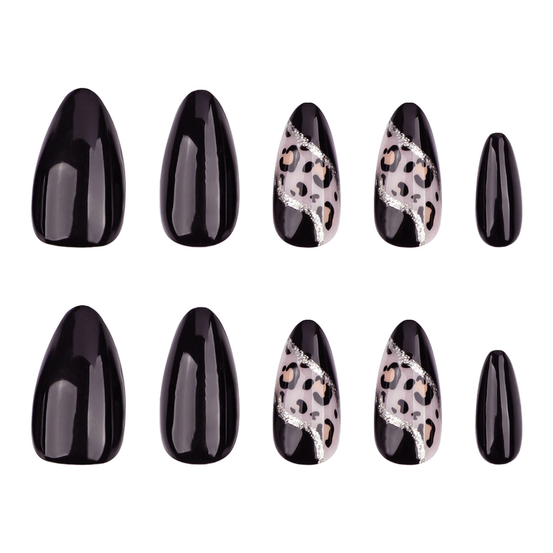 Artistic stiletto nails with leopard design and glitter effects Kalsten