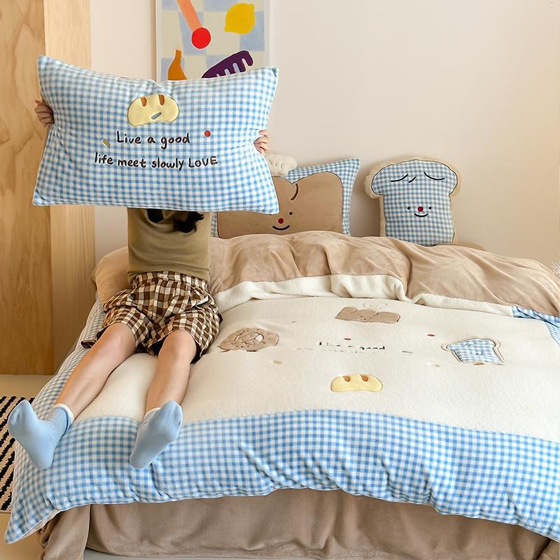 Children's bedding set with quilted cozy blanket, plush decorative pillow, and vichy check trim