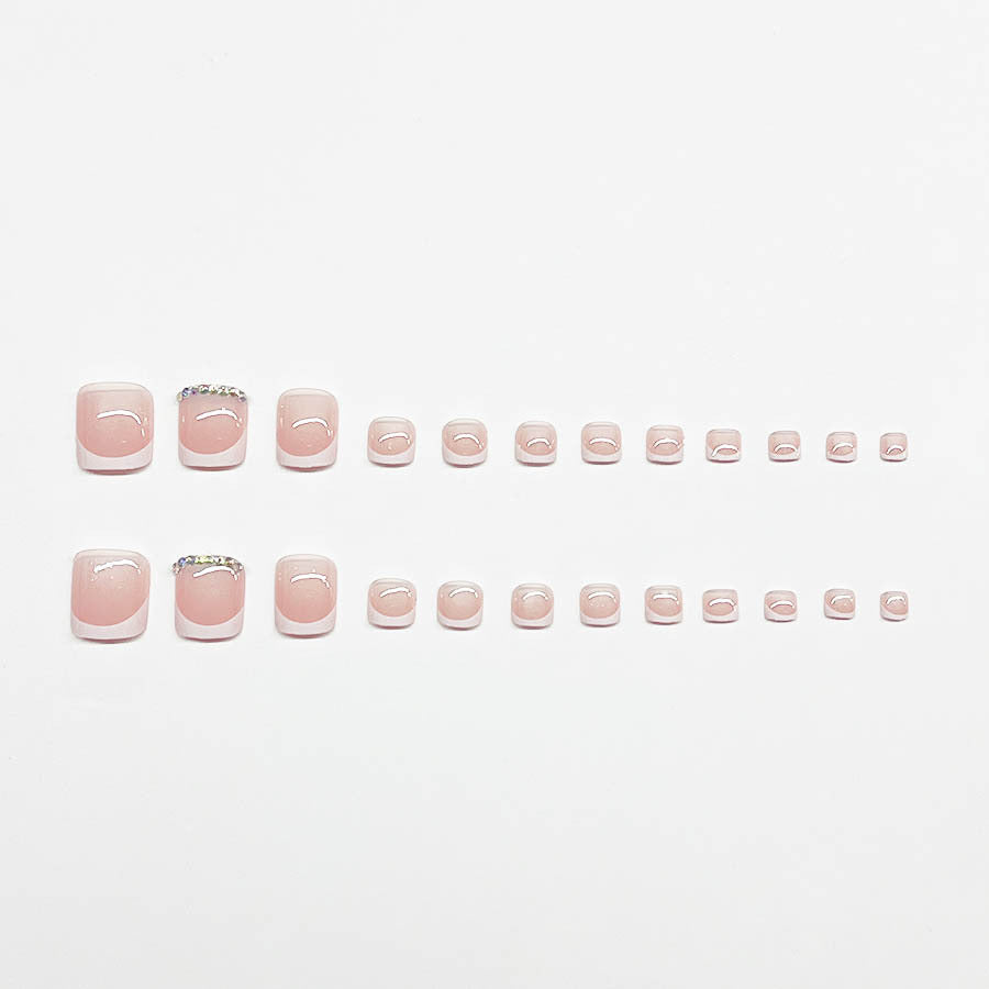 Nail art set with elegant French design and sparkling accents Kalsten
