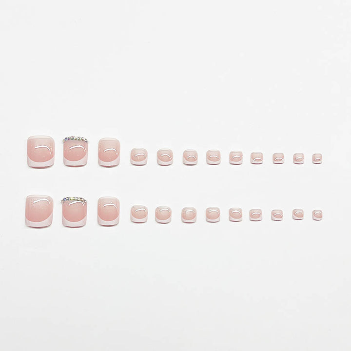 Nail art set with elegant French design and sparkling accents Kalsten