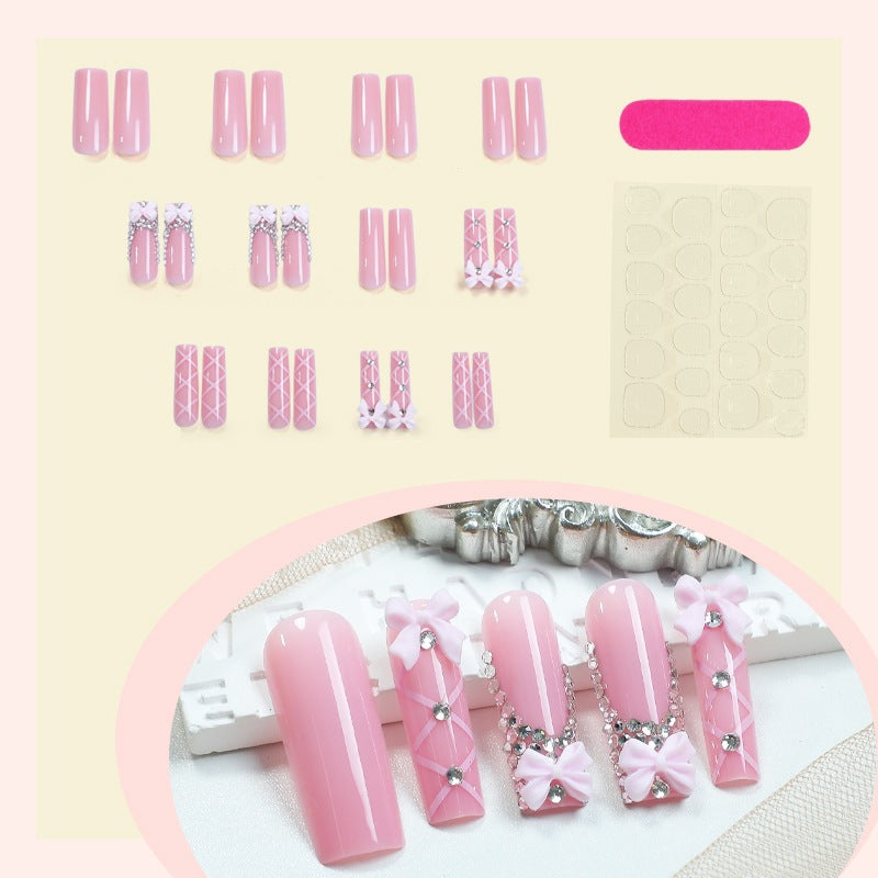 Artificial nail set with romantic bow and glitter accents Kalsten