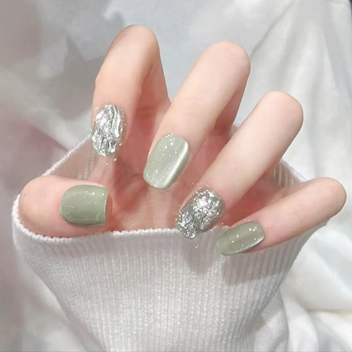 Acrylic nail set with elegant glitter design and creative effects Kalsten