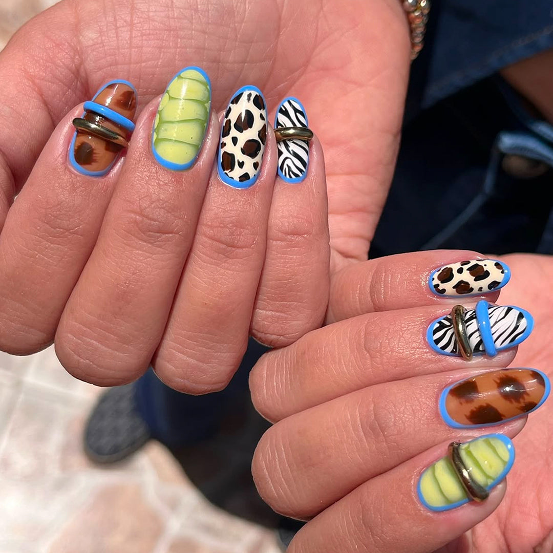 Creative art stick-on nails with modern animal motifs and colorful accents Kalsten