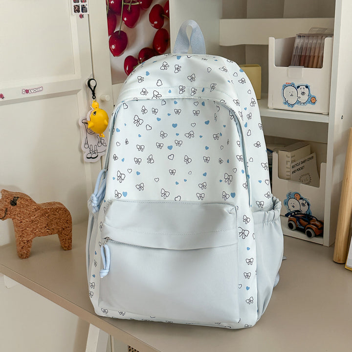 Playful Heart and Bow Patterned Backpack
