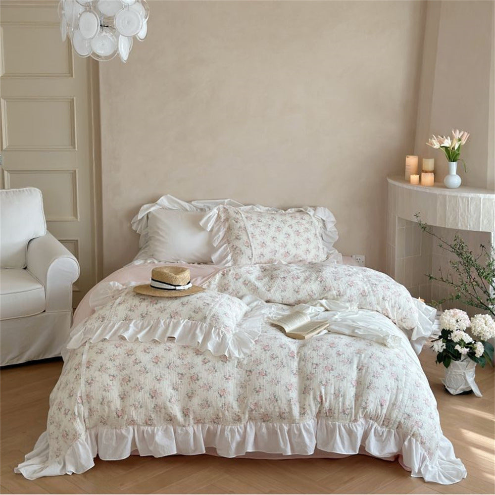 Romantic bedding set made of cotton-linen with delicate ruffles and floral pattern