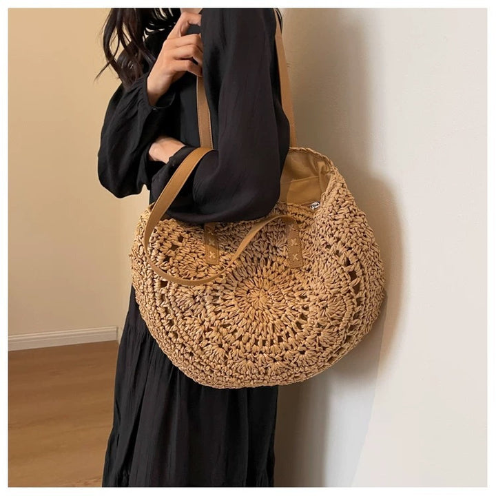 Round-woven beach bag with leather handles Kalsten