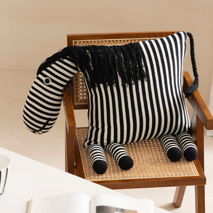 Striped decorative knitted cushion in animal shape with fringes and four-legged look Kalsten