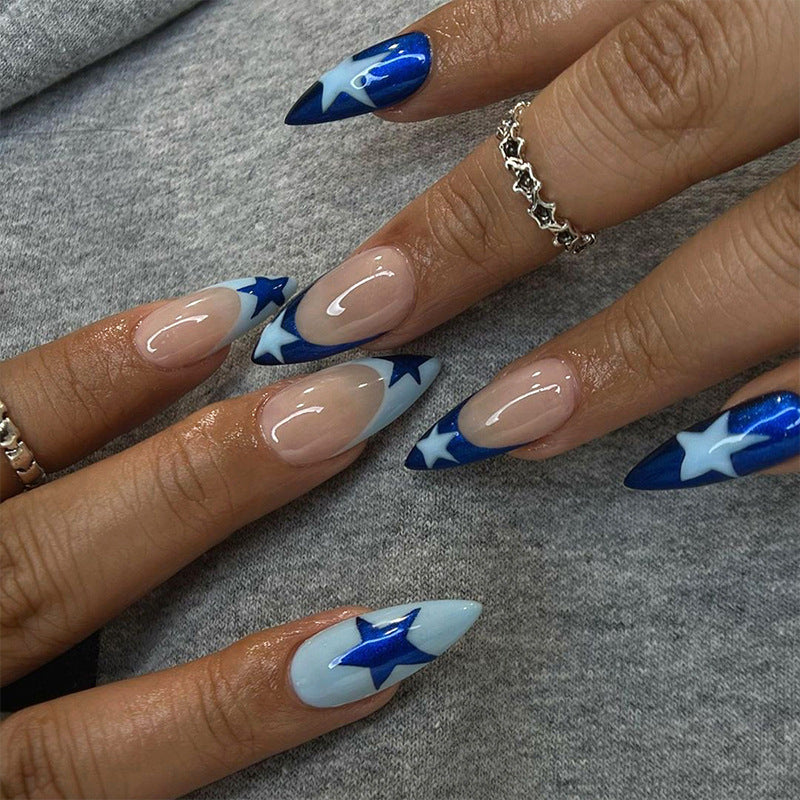 Artful stiletto nails with heart-shaped accents Kalsten