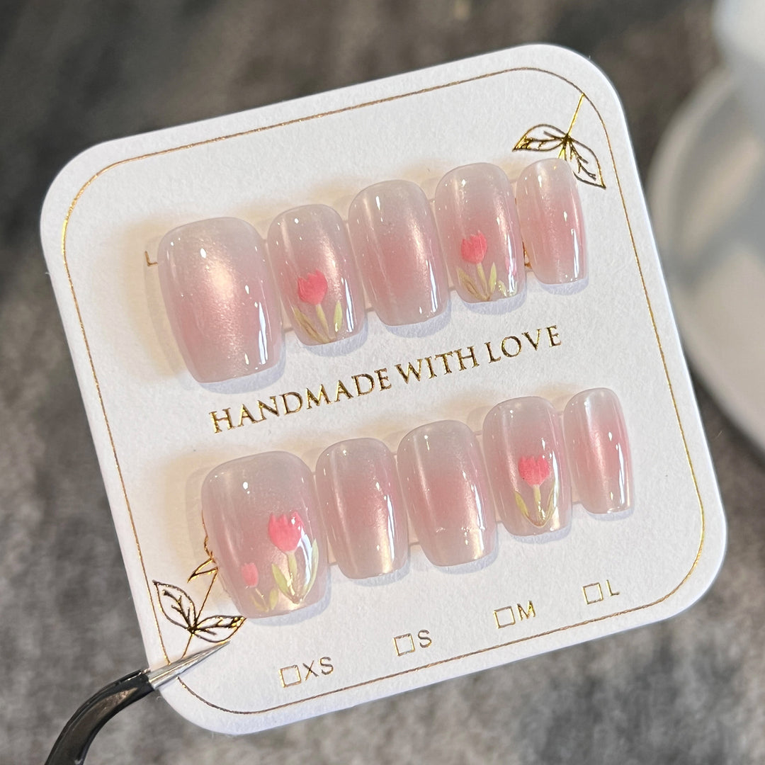 Artificial nail art with floral decorations Kalsten