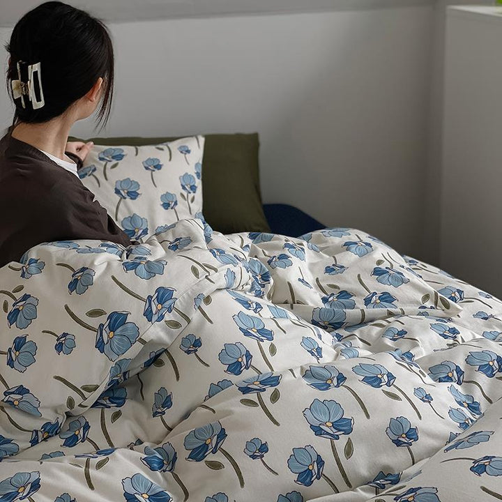 Cotton percale duvet cover and pillowcase set with fine watercolor flower print and hotel closure