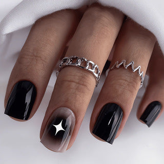 Artificial nails in elegant black with gloss and creative accents Kalsten