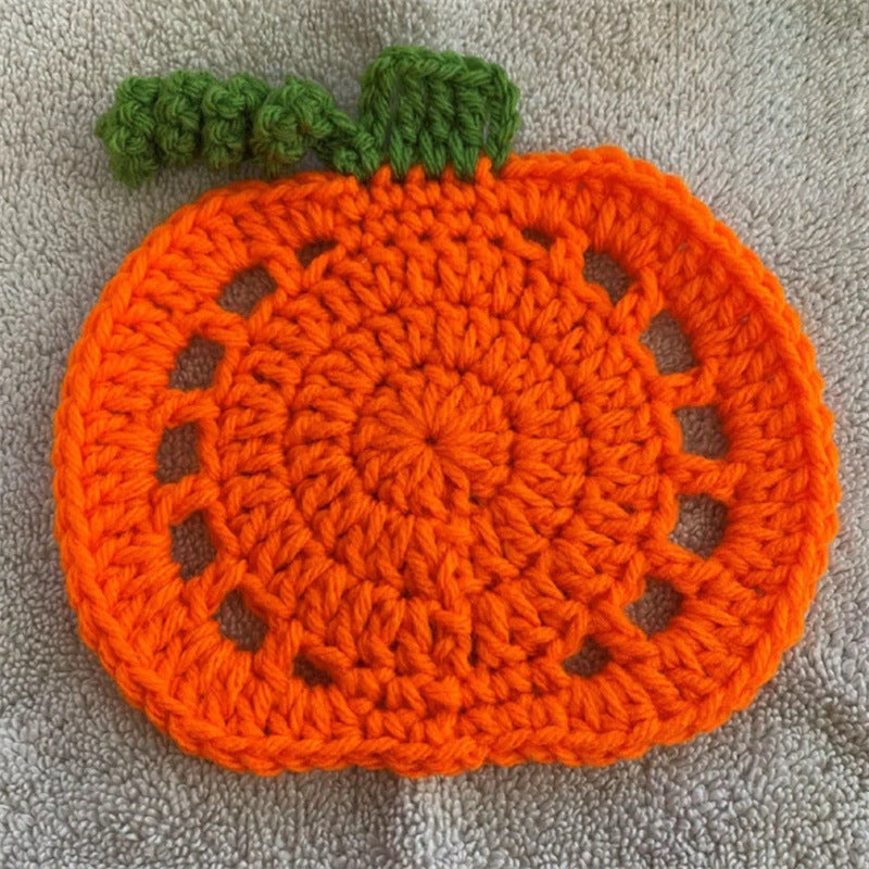 Hand-crocheted pumpkin pot holder and table mat made of cotton yarn