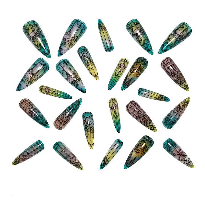 Artificial nails in elegant stiletto design with elaborate motifs Kalsten