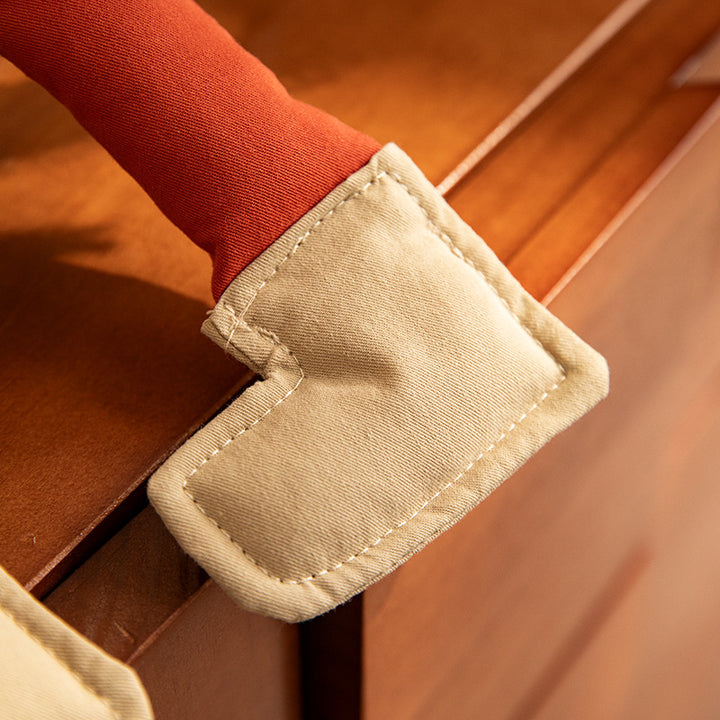 playful shoulder bag made of soft fabric with padded carrying handle and decorative legs Kalsten