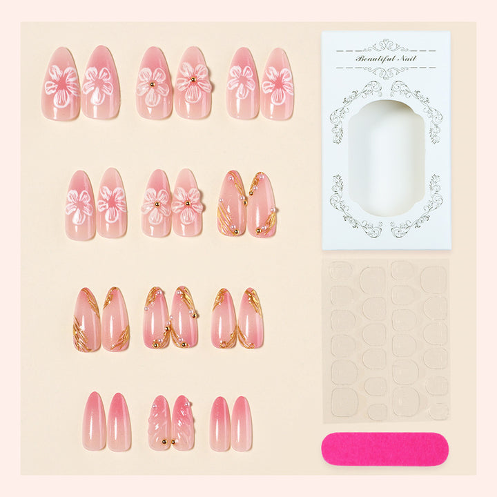Creative nail art set with floral and golden accents Kalsten