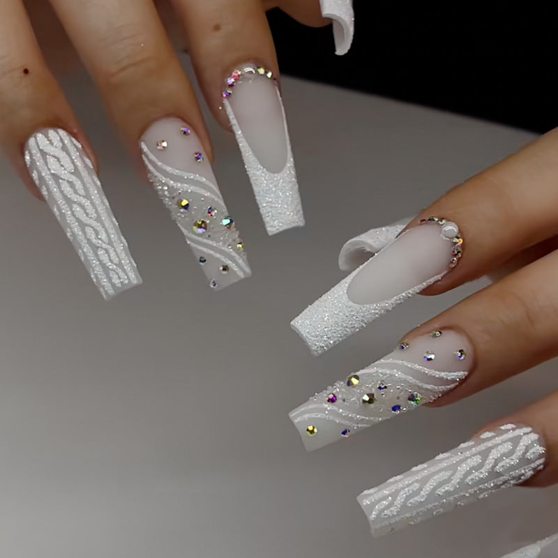 Artistic Press-On Nail Design with Rhinestone and Embellishments Kalsten