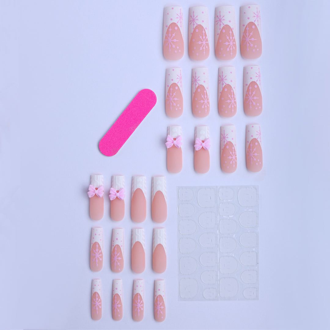 Artificial nail tips with playful bows and snowflake design Kalsten