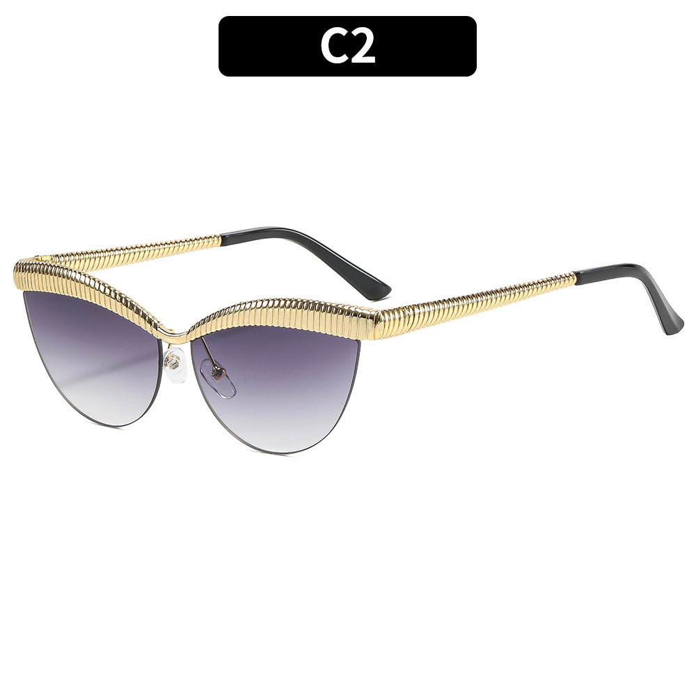 Elegant Cat-Eye Sunglasses with Metallic Accents