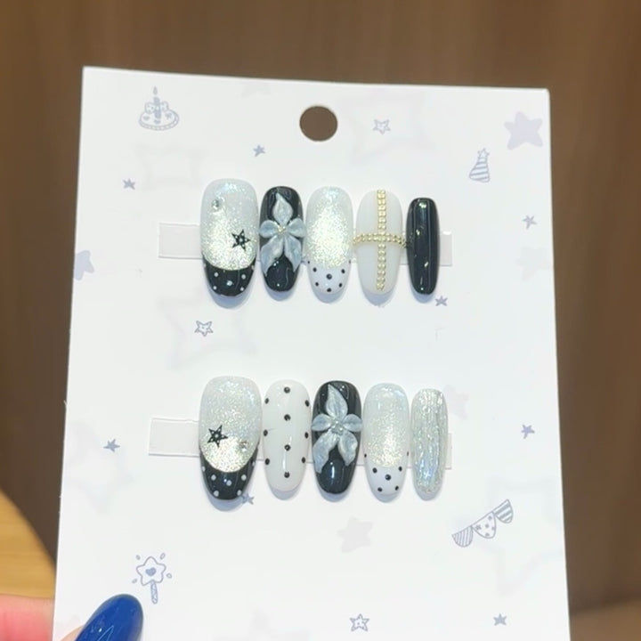 Glamorous artificial nail tips with floral accents Kalsten