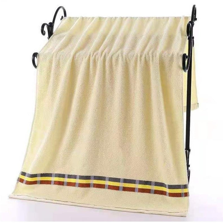 Women’s terry bath towel with elegant striped border Kalsten