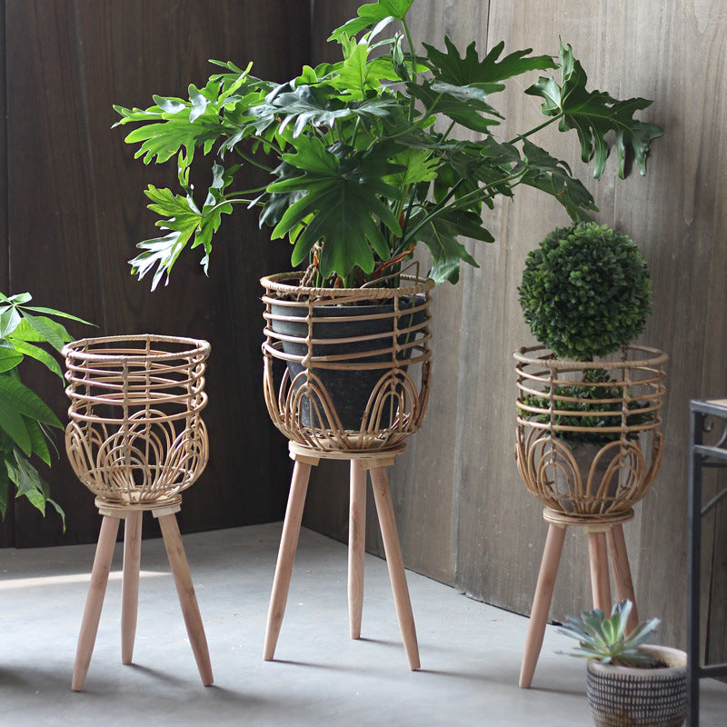 Stylish plant stand made of rattan and wood Kalsten
