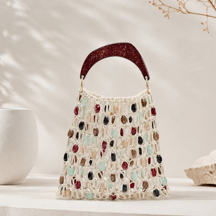 Handcrafted designer shoulder bag with unique stone accents Kalsten