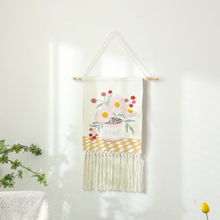 Woven cotton wall hanging with punch needle flower relief and fringes Kalsten
