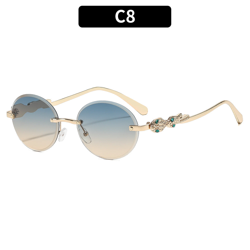 Fashion-Forward Round Frame Sunglasses with Ornate Details