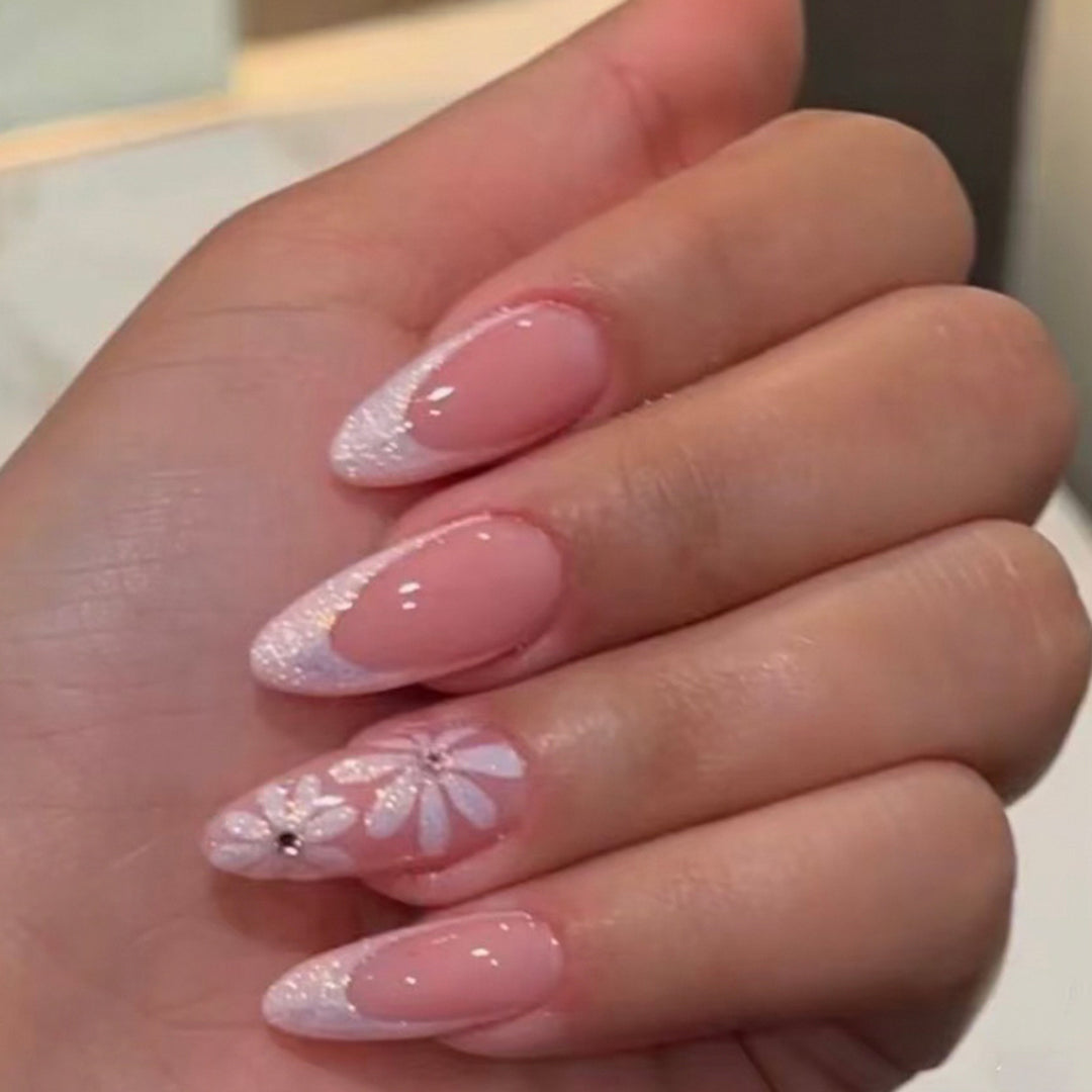 Elegant artificial nails with floral design and glitter embellishments Kalsten
