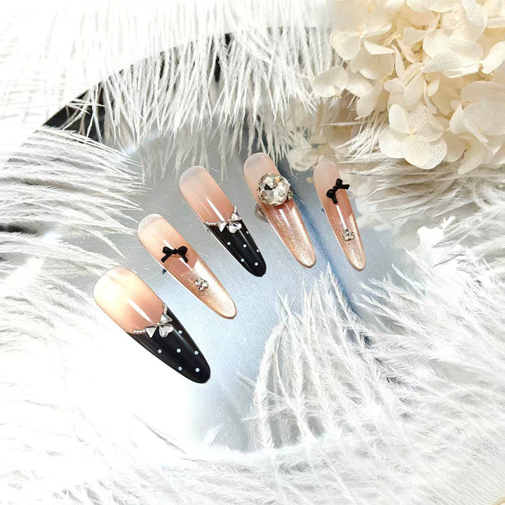 Stylish glitter accent artificial nails with elegant detailing Kalsten